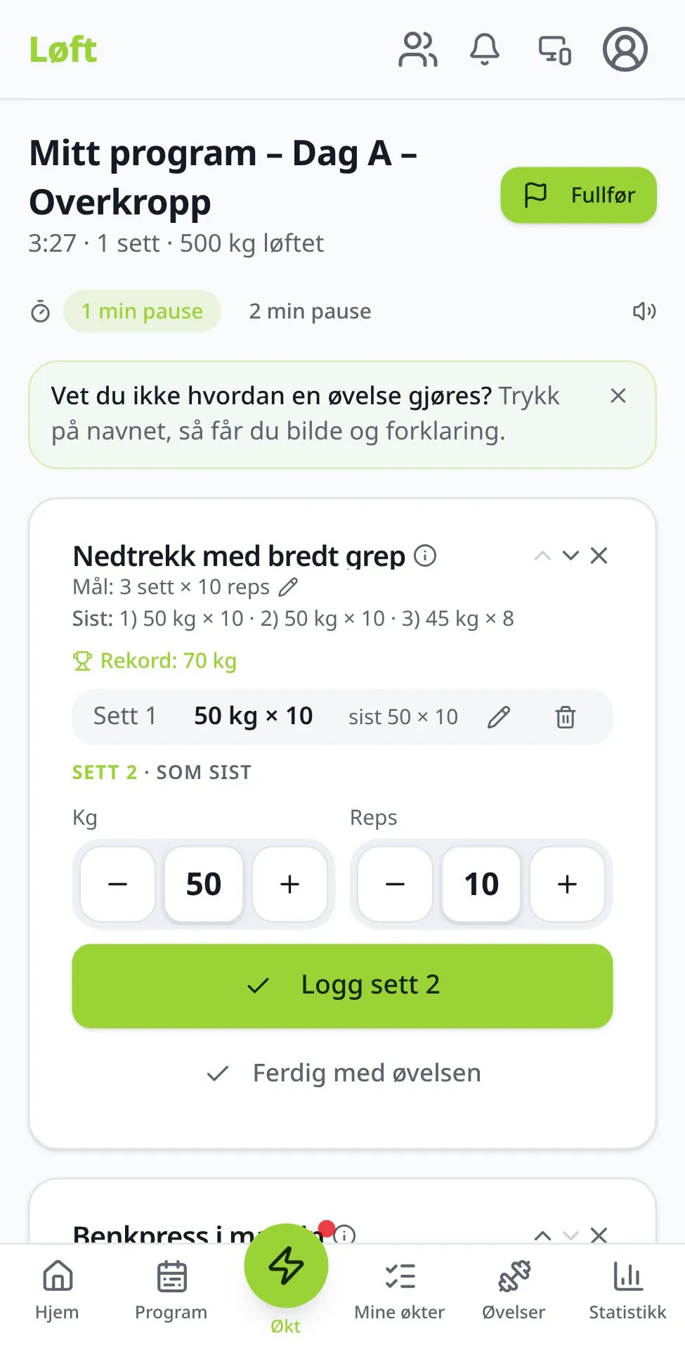 Øktkort i Løft for nedtrekk med bredt grep med rekord 70 kg, «Sist: 1) 50 kg × 10 · 2) 50 kg × 10 · 3) 45 kg × 8», sett 1 logget som 50 kg × 10 og «Sett 2 · som sist» ferdig utfylt med 50 kg og 10 reps